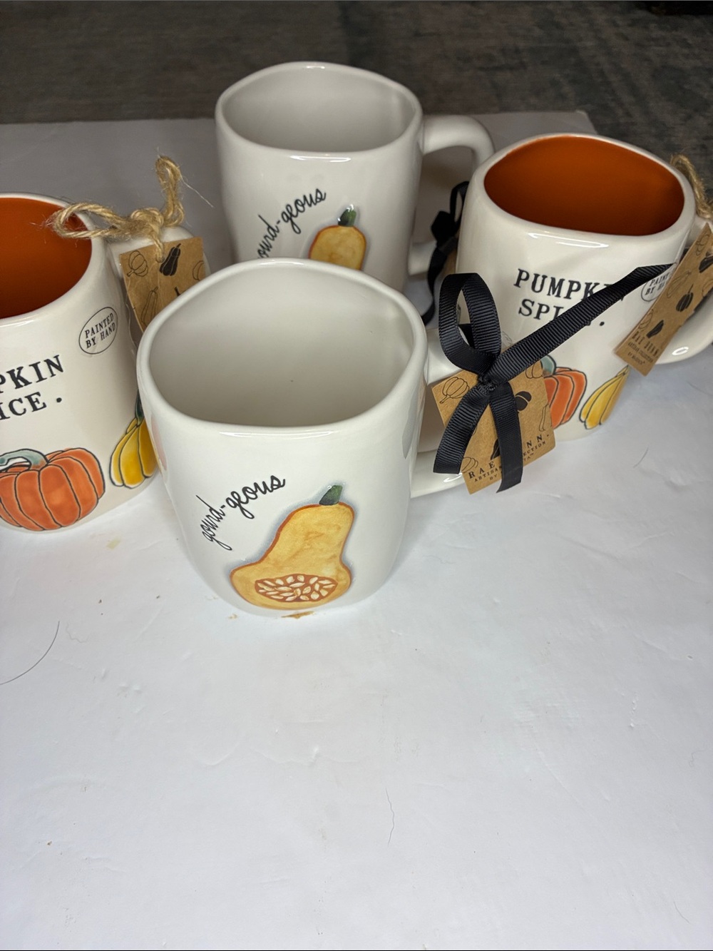 NWT  Rae Dunn White Ceramic Mug Set with Orange Interior and Autumn Fruit Design